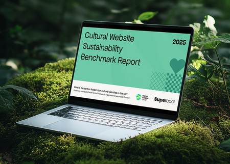 A laptop is sat, open, on a bed of moss in a verdant, light-dappled woodland. On the laptop is the cover of a report: on a green background are the words “Cultural Website Sustainability Benchmark Report 2025”. To the bottom right is the Supercool logo.