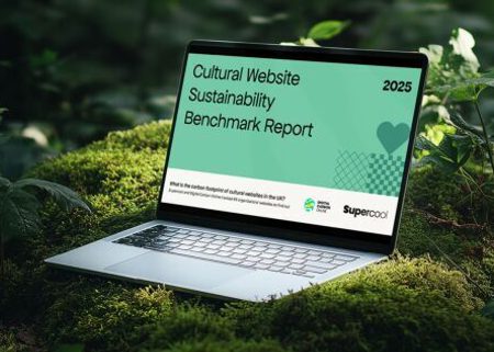 A laptop is sat, open, on a bed of moss in a verdant, light-dappled woodland. On the laptop is the cover of a report: on a green background are the words “Cultural Website Sustainability Benchmark Report 2025”. To the bottom right is the Supercool logo.