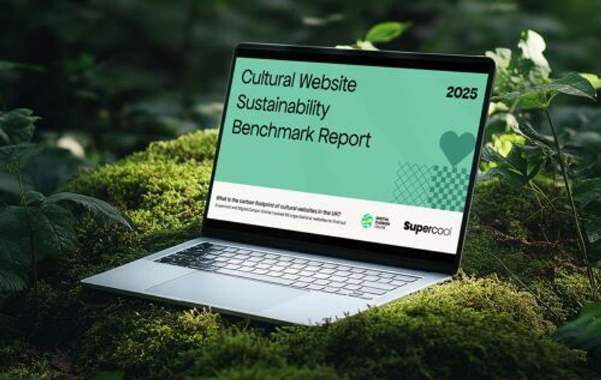 A laptop is sat, open, on a bed of moss in a verdant, light-dappled woodland. On the laptop is the cover of a report: on a green background are the words “Cultural Website Sustainability Benchmark Report 2025”. To the bottom right is the Supercool logo.